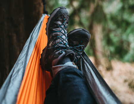 hiking-shoes-crossed-in-hammock