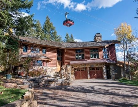 Large Jackson Hole Cabin with Jackson Hole Mountain Resort Tram in background.